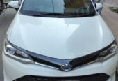 Toyota Axio WXB 2016 (Hybrid) Car For Sale